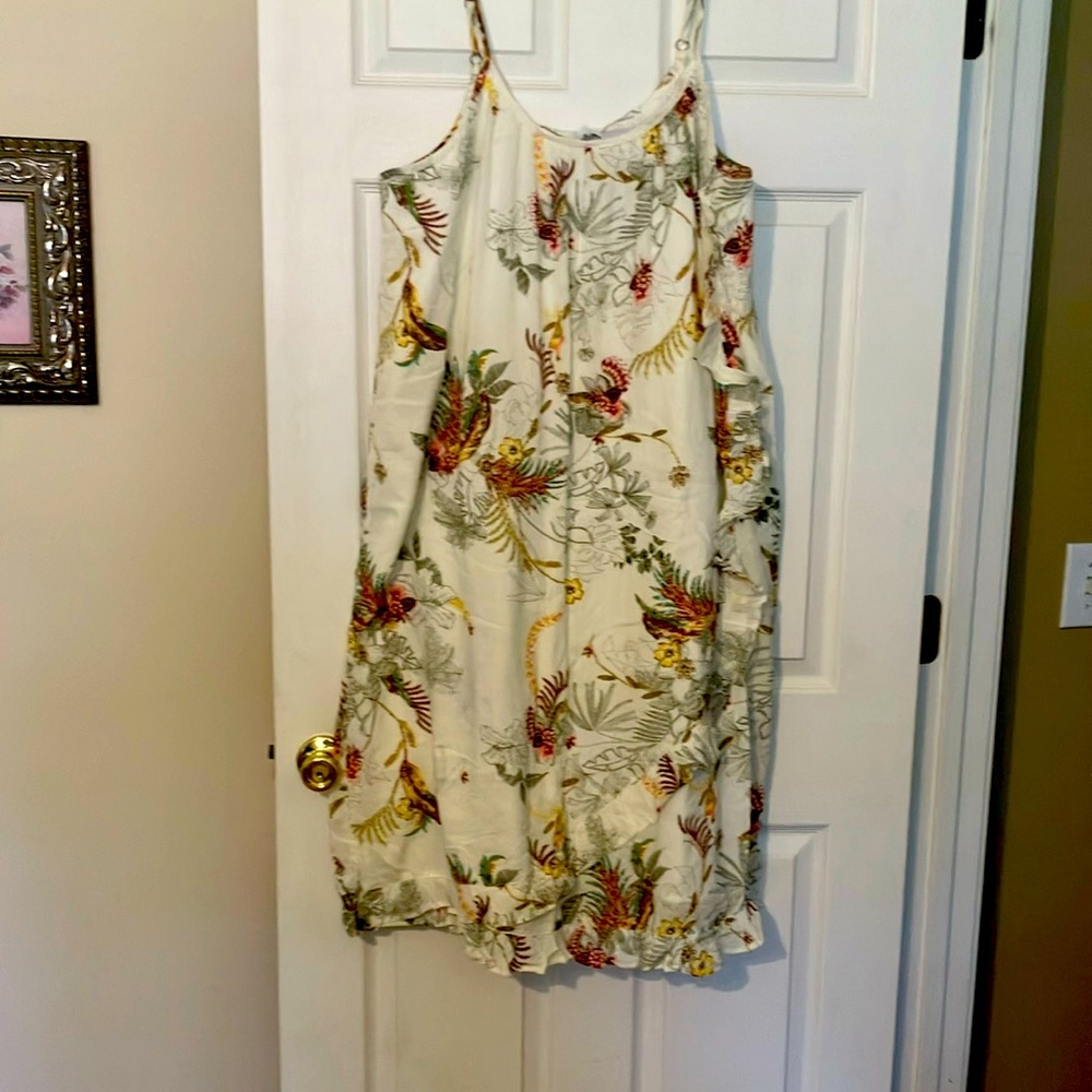 XL off- white floral sundress with ruffle down side of dress.